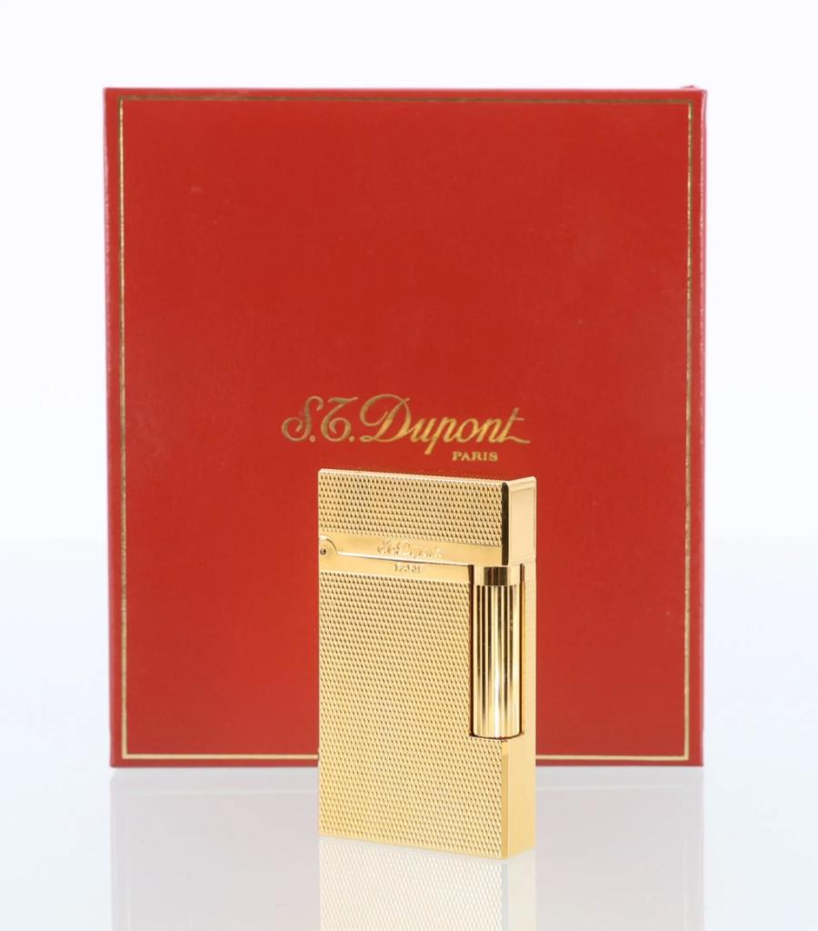 Expertise S.T. DUPONT Briquet en métal doré guilloché dans son écrin - Artemis Estimations