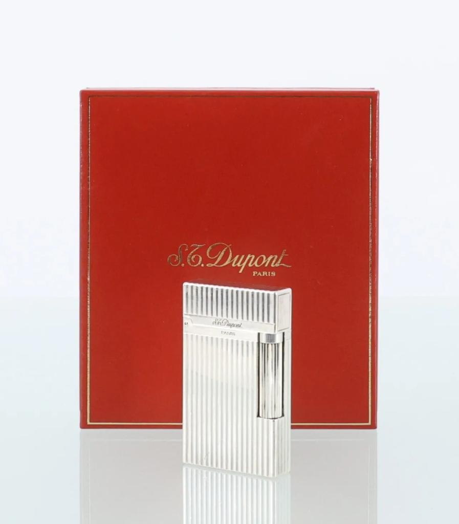 Expertise S.T. DUPONT  Briquet en métal argenté guilloché dans son écrin - Artemis Estimations