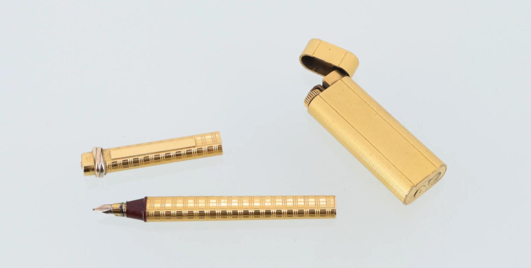 Expertise CARTIER Stylo Trinity plaqué or et  un briquet en métal plaqué or - Artemis Estimations