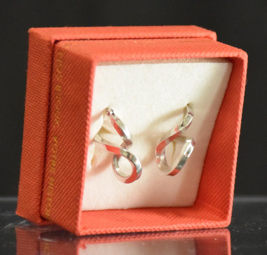 Expertise Paire de créole ruban infini argent - Artemis Estimations